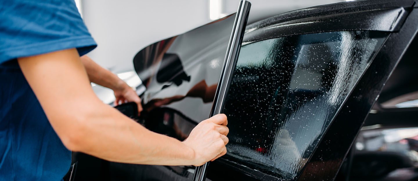 Window tinting service in progress